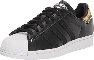 Unisex-Child Superstar Black/Black/Team Collegiate Gold 4.5